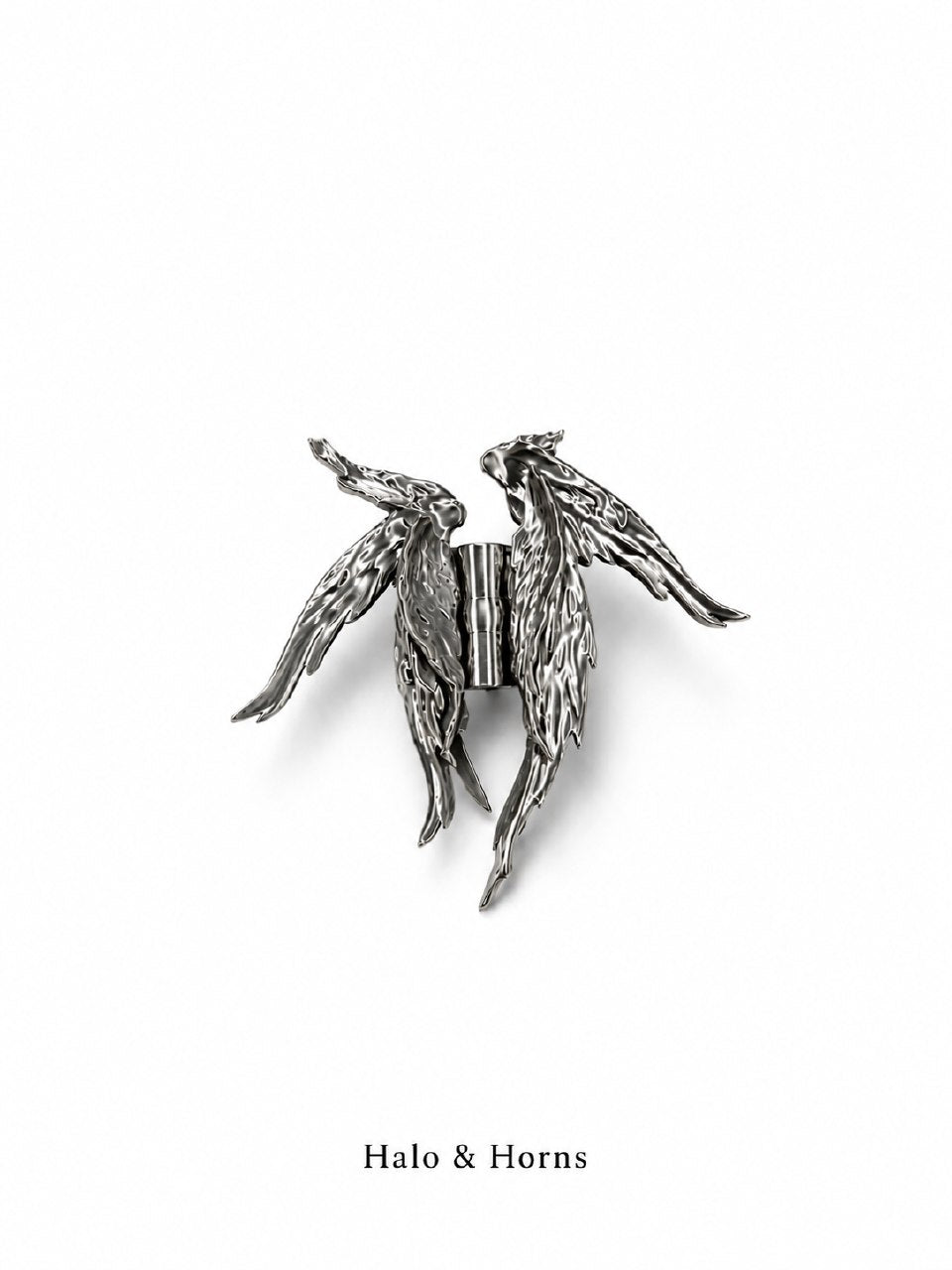 Angelic Rhythms wing claw clip in Horn Shadow, a dark silver 3D printed hair clip